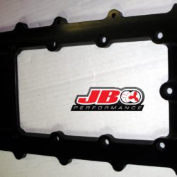 Black automotive part with JB Performance logo.